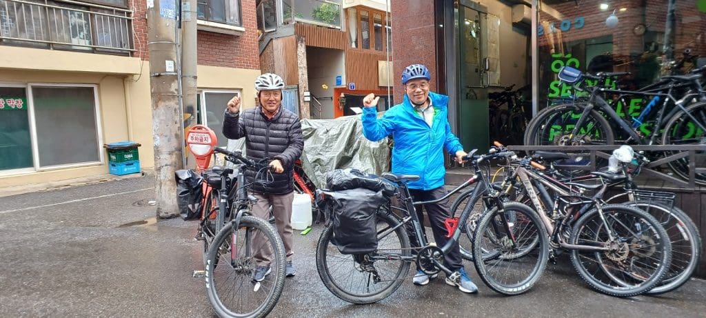 Two Japanese riders with Banjo e-bikes