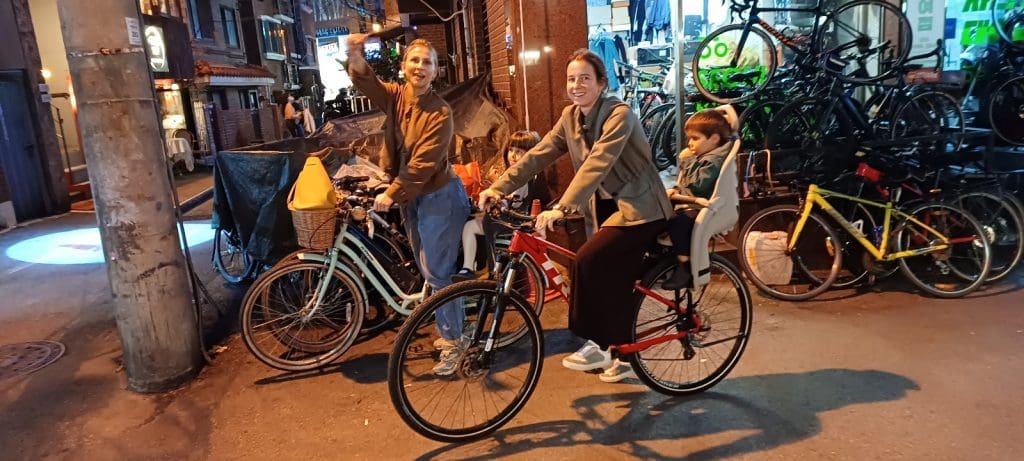 Customers with child carrier on bikes